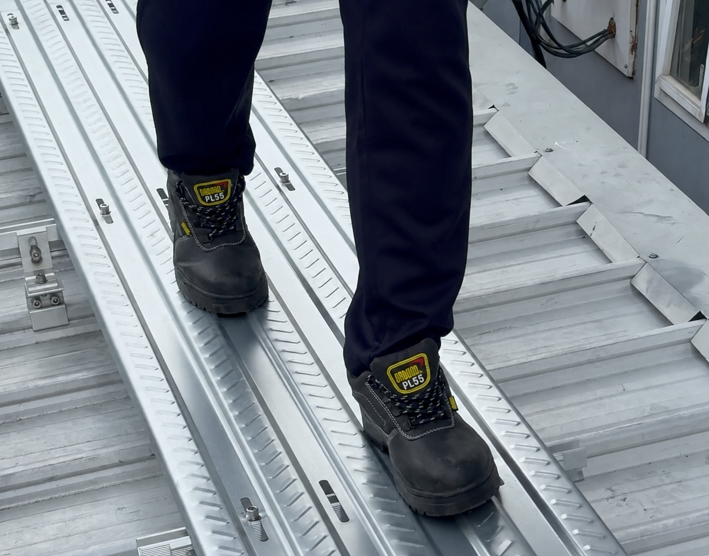 Worker on ZAM Walkway